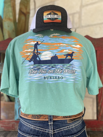 Men's Burlebo T-Shirt with Graphic of a man on a boat with its dog and the words " See you on the Water" and " Burlebo" underneath - SYOTWSSCM - BLAIR'S Western Wear located in Marble Falls TX