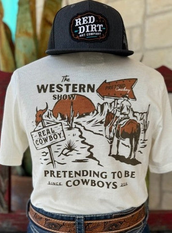 Men's Sendero Graphic T-Shirt: Graphic of Cowboy Riding onto the Sunset in the Desert with Brown Lettering that say "The Western Show" and "Pretending to be Cowboys" along with two signs that say "Real Cowboy" and "Pretend Cowboy" - WESTERN SHOW - BLAIR'S Western Wear located in Marble Falls TX